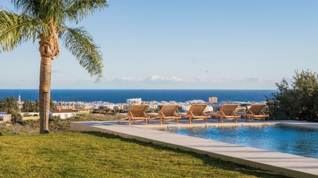 Luxury villa The Retreat in Estepona Hills showcasing breathtaking sea and mountain views exclusive amenities presented by MDR Luxury Homes