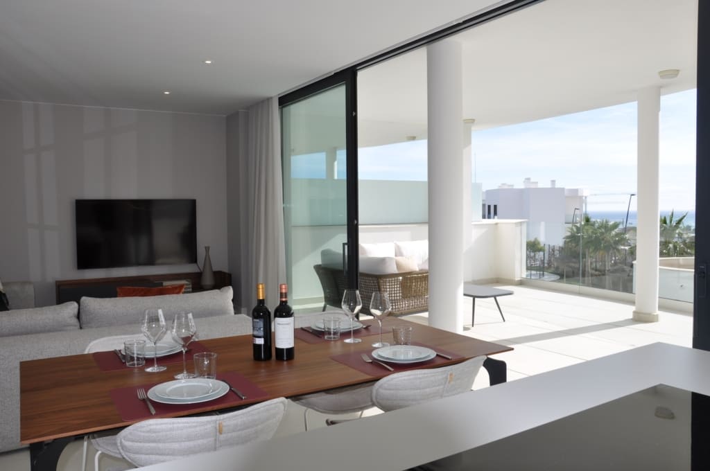 Move-in ready luxury apartment in Higuerón West with sea views and high-end finishes. For sale with MDR Luxury Homes. 
