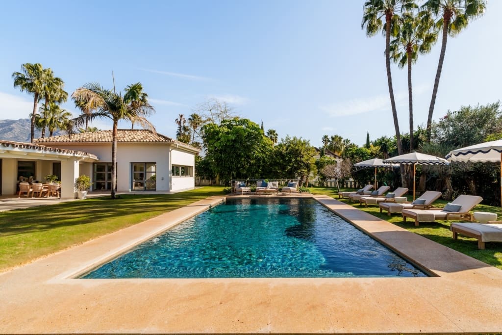 Villa Palm Springs in La Cerquilla, Marbella – luxury bungalow with botanical gardens and pool, listed by MDR Luxury Homes.
